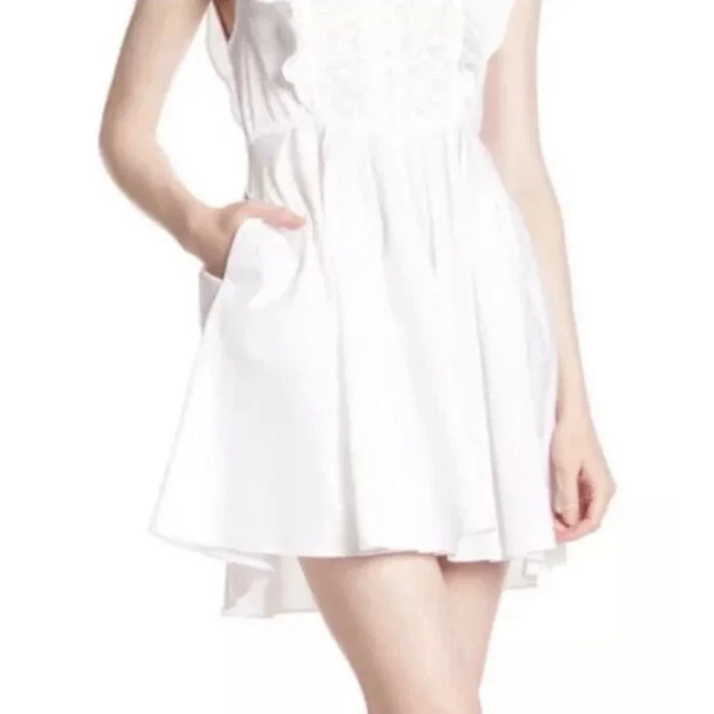 FREE PEOPLE Womens sz Large Half Moon white crochet ruffled fit & flare  pockets